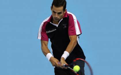 KUALA LUMPUR, MALAYSIA - SEPTEMBER 28: Santiago Giraldo of Colombia competes against Nick Kyrgios of Australia during the 2015 ATP Malaysian Open at Bukit Jalil National Stadium on September 28, 2015 in Kuala Lumpur, Malaysia. (Photo by How Foo Yeen/Getty Images)