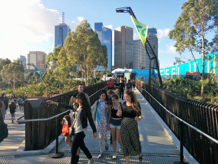 Crowd walking back to the city along the new bridge