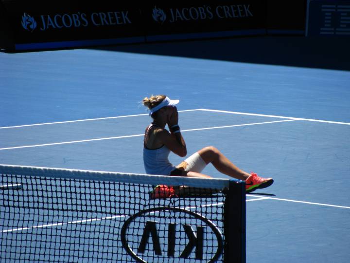 Marta Kostiuk after hitting the decisive winner and claiming the junior's title