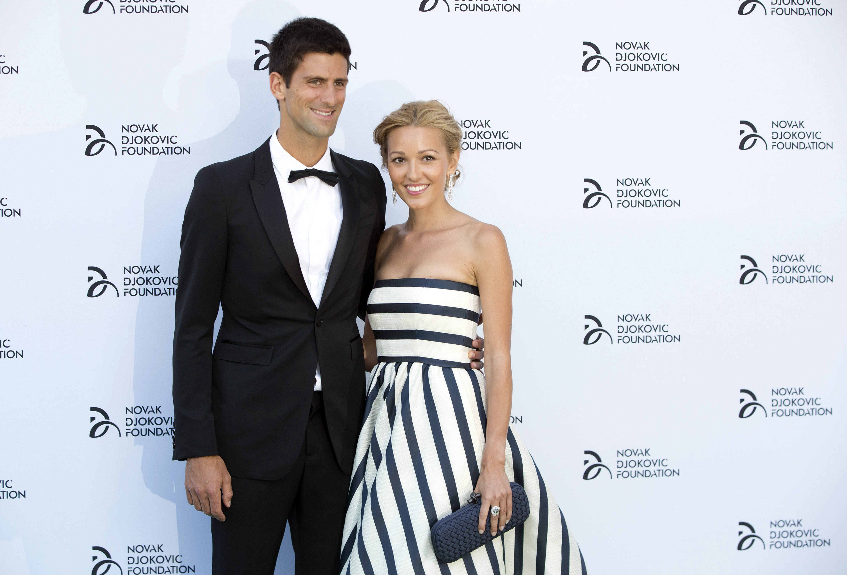 Serbian tennis player Novak Djokovic and his girlfriend Jelena Ristic pose ...